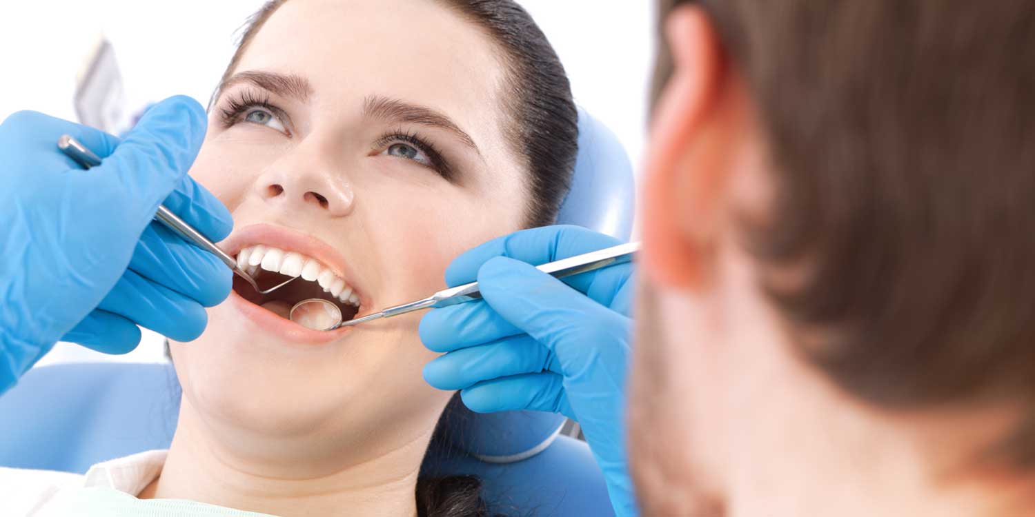 Doctor is Checking Patient's Mouth